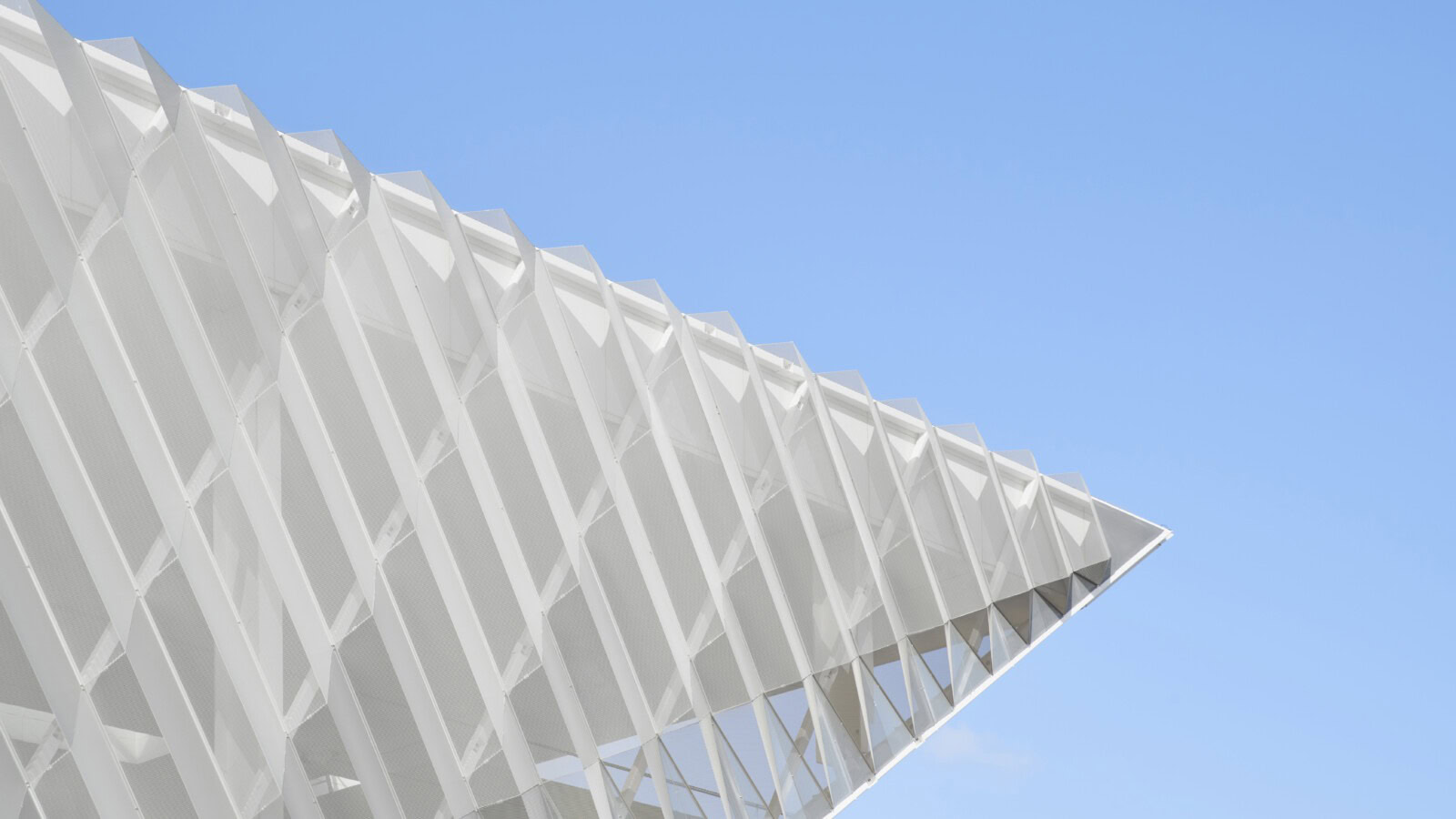 Detail of angular translucent canopy at Reservoir Station – sustainable transport architecture by Genton in Melbourne
