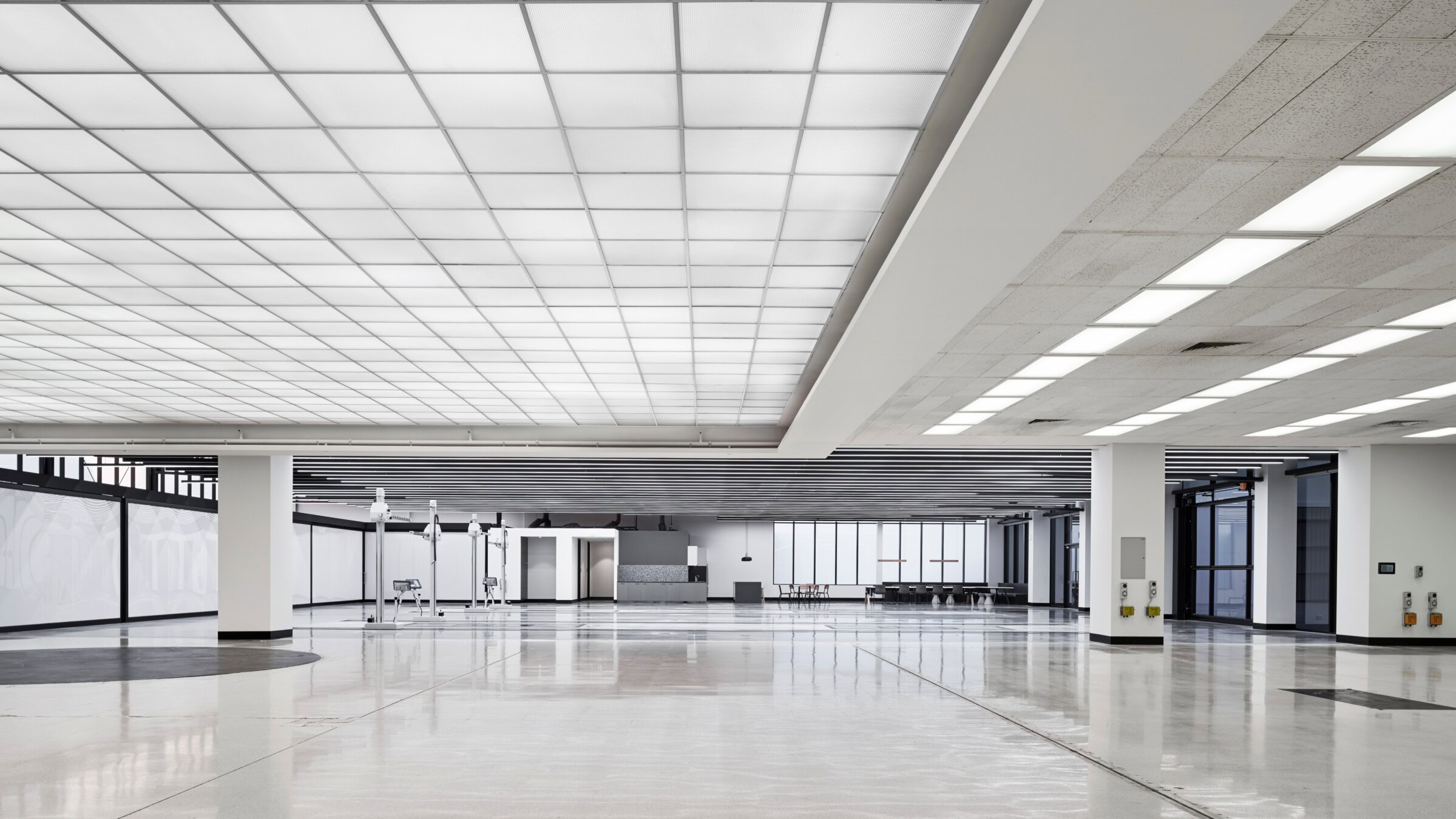 Interior of Ford Design Centre in Sydney by Genton, showing clean spatial layout and luminous ceiling — echoing the precision of data centre architect Sydney design standards.