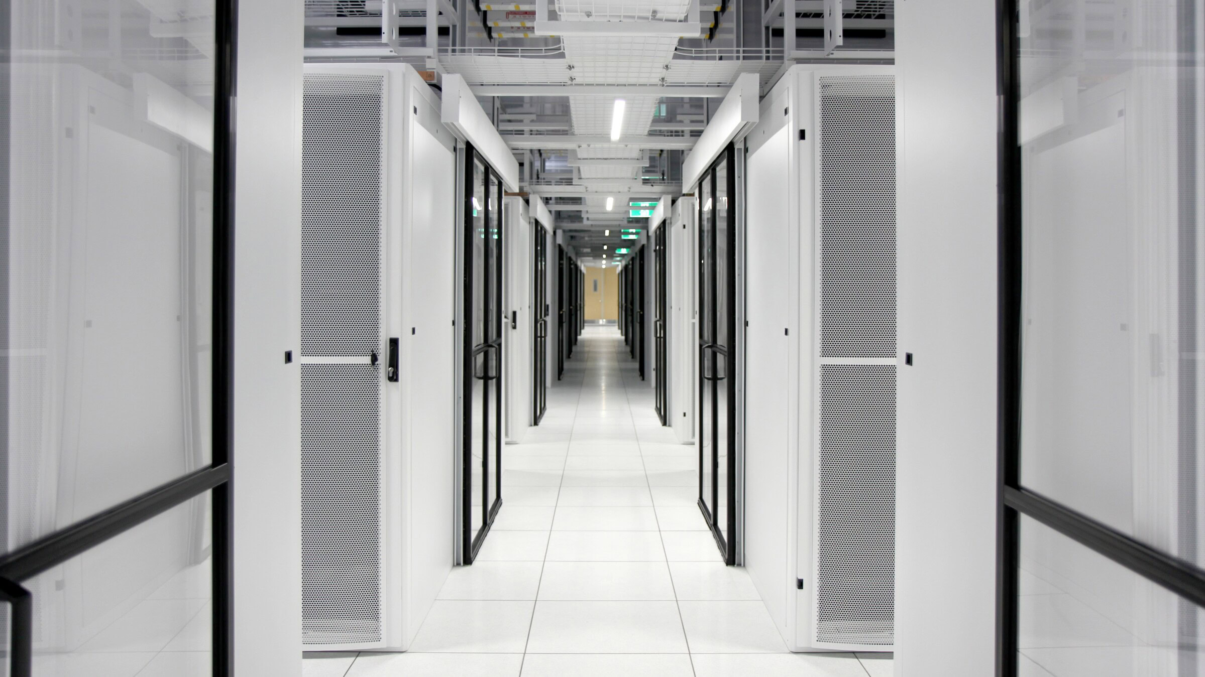 Data centre architect Sydney – internal corridor with server racks at Genton’s Sydney Processing Centre